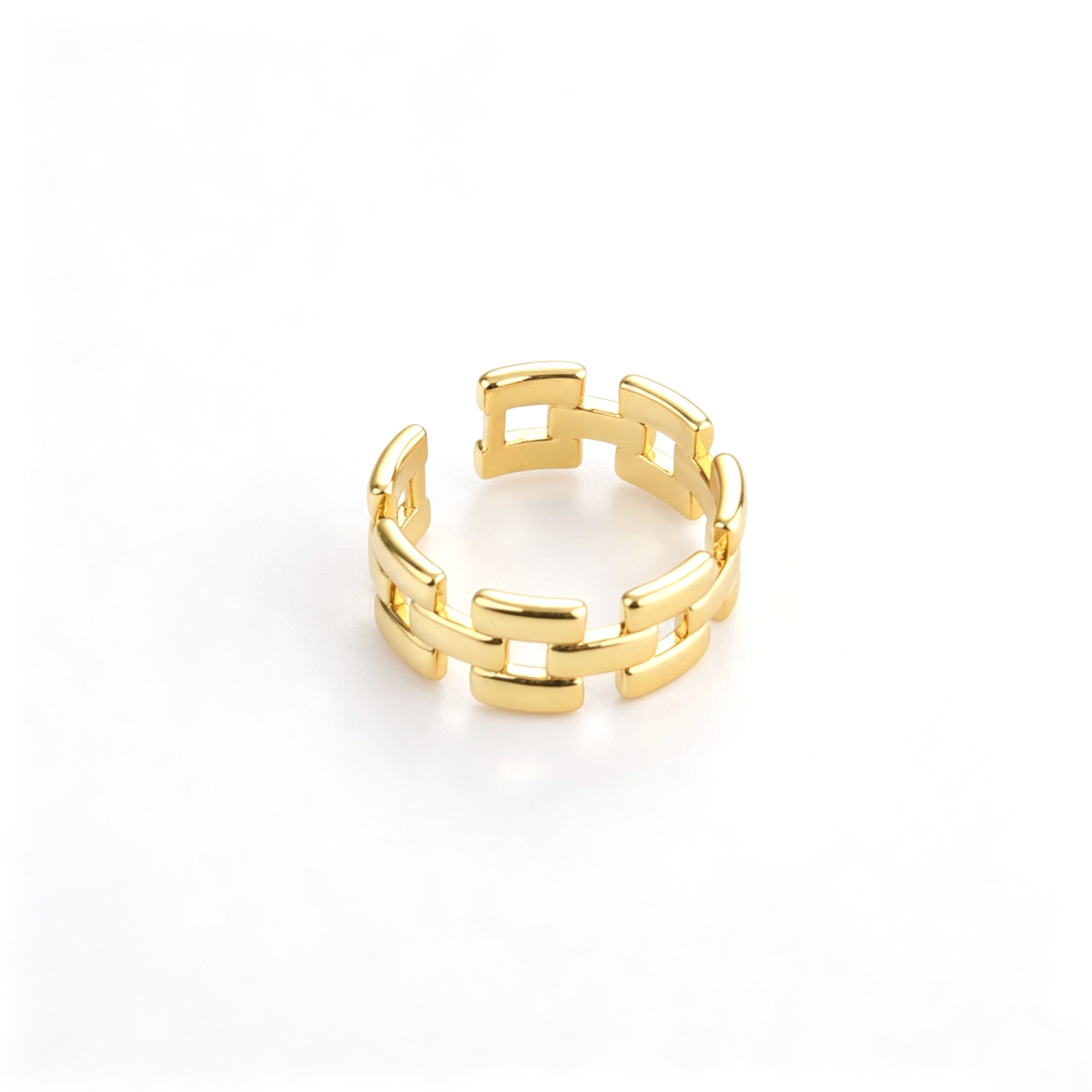 Open cuff ring shown from the front, highlighting the repeating link pattern