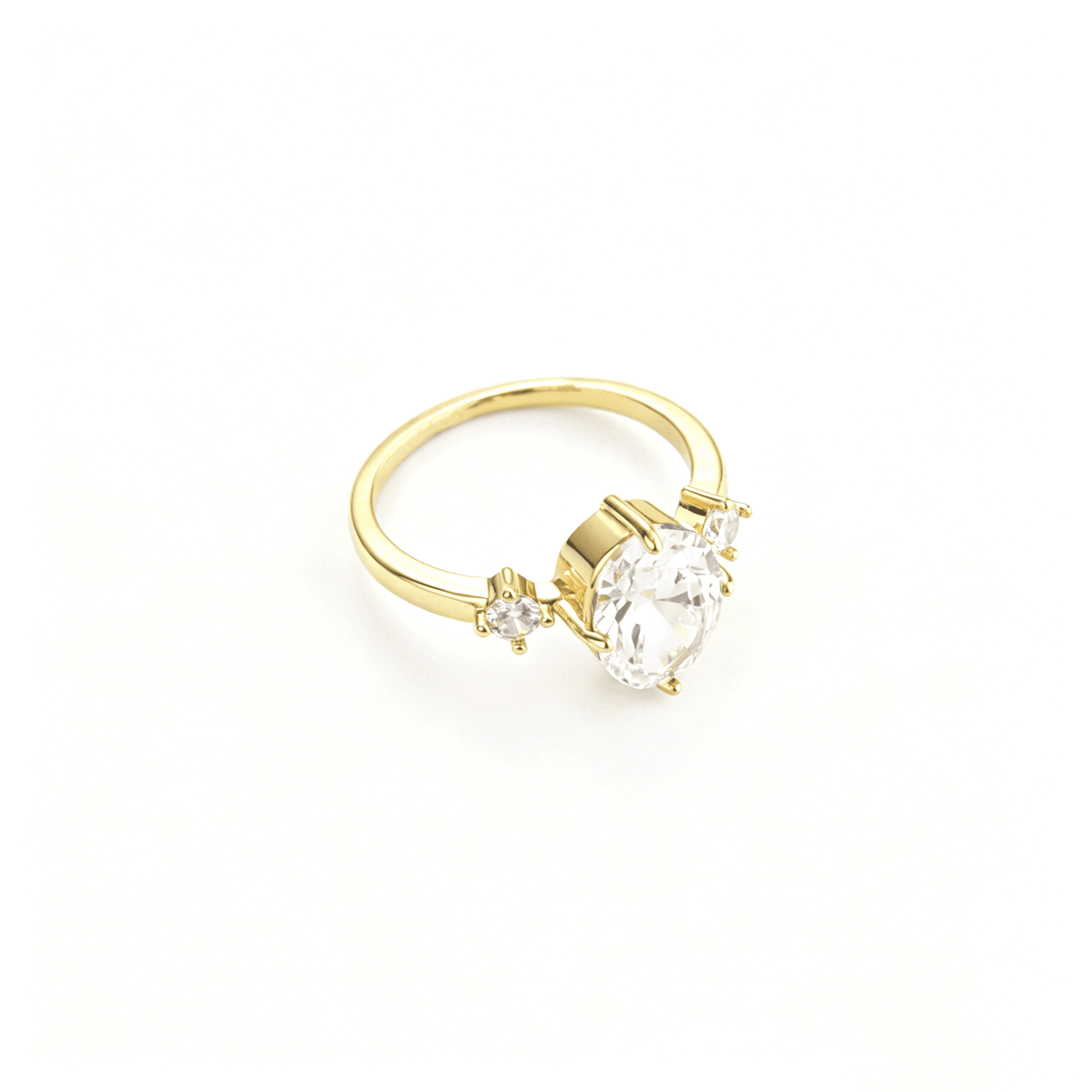 Three-quarter side perspective of the classic 3-stone gold plated statement ring highlighting the sturdy multi-prong setting.