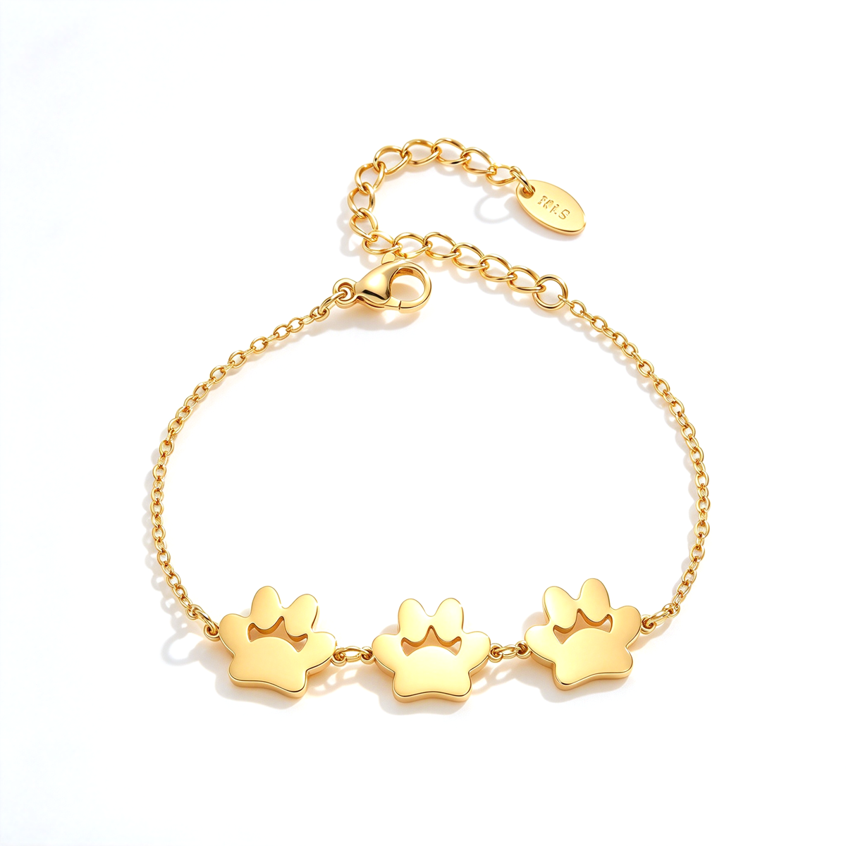 Paw print bracelet with three small paw-shaped charms arranged along the front of the chain.