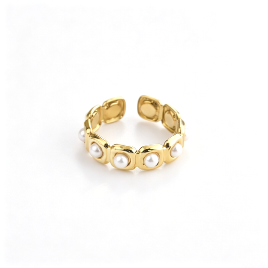 Pearl accent cuff ring shown from a front angled view with repeating pearl details