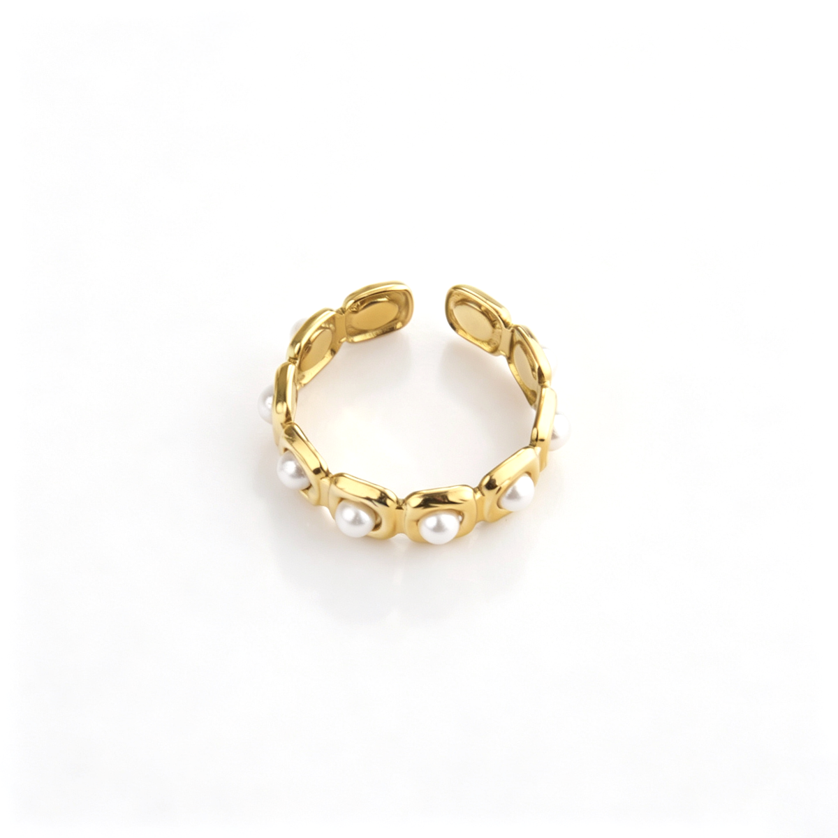 Pearl accent ring shown from the back, highlighting the open band and rounded settings