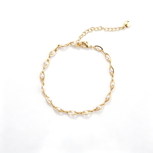 Pearl chain bracelet with repeating oval links and white bead accents