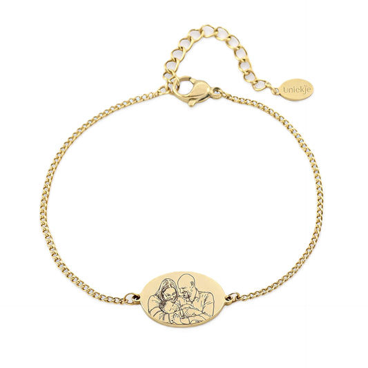 Front view of personalized engraved family bracelet with oval portrait charm and chain design displayed on white background