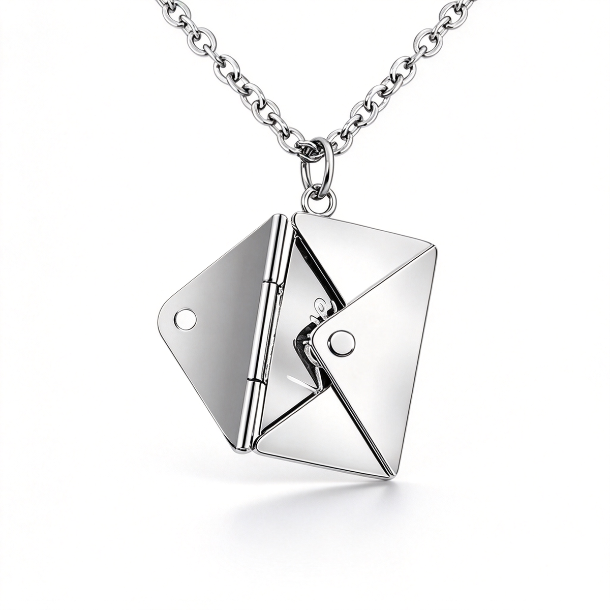 Silver-tone envelope pendant close-up showing the triangular folds, hinge, and front closure.