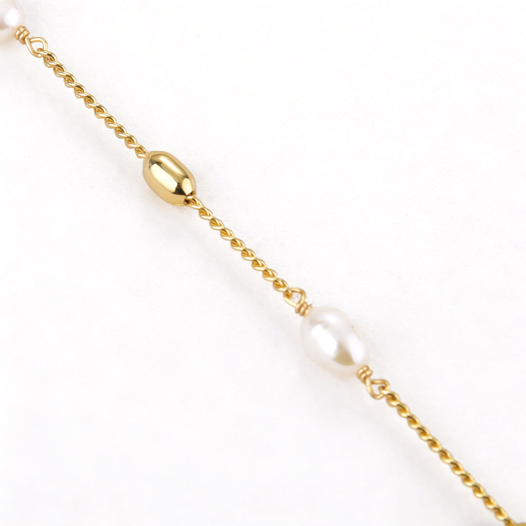 Macro shot highlighting the smooth, polished texture of 18k gold vacuum plating on brass.