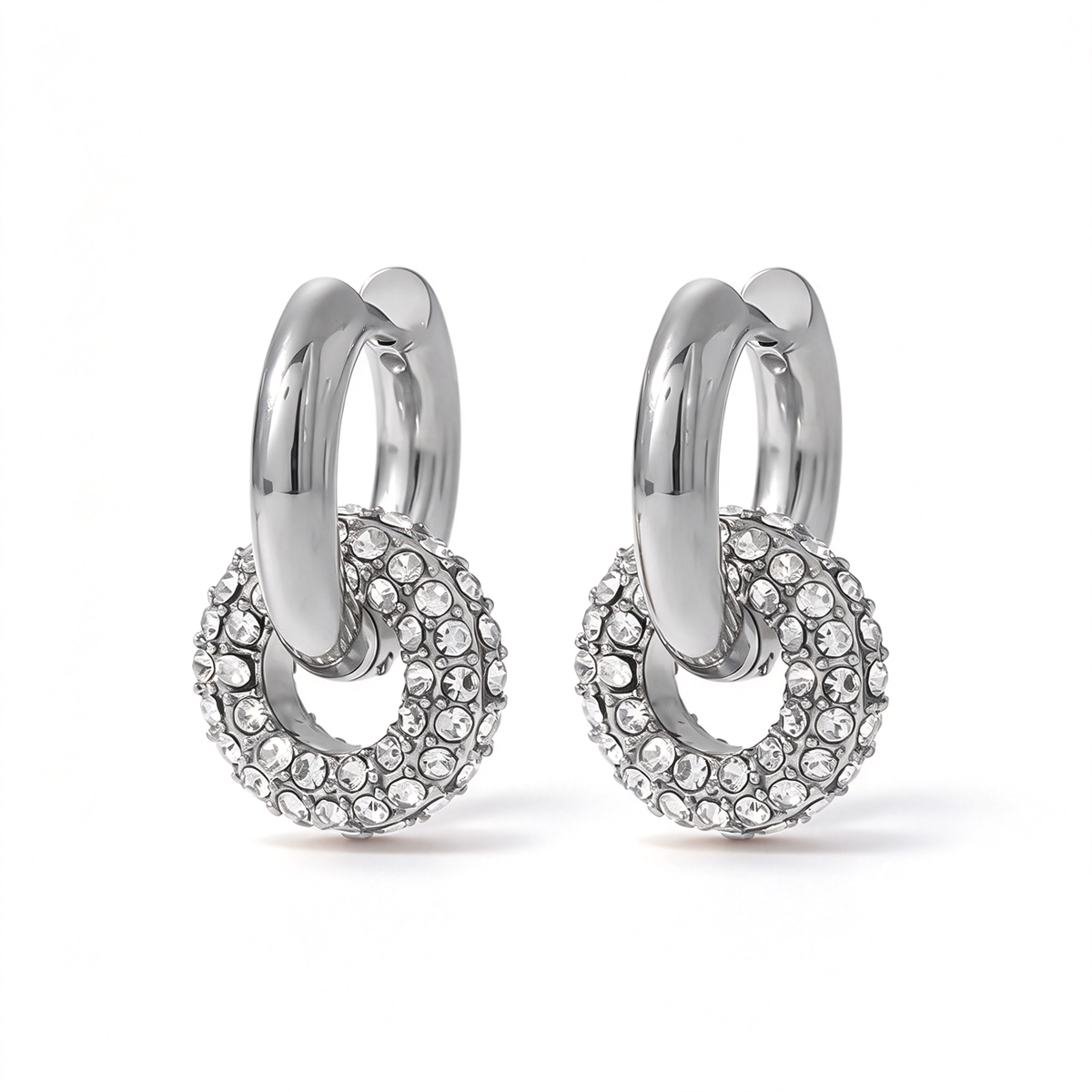Silver-tone hoops with clear circular drop details and sparkling accents.