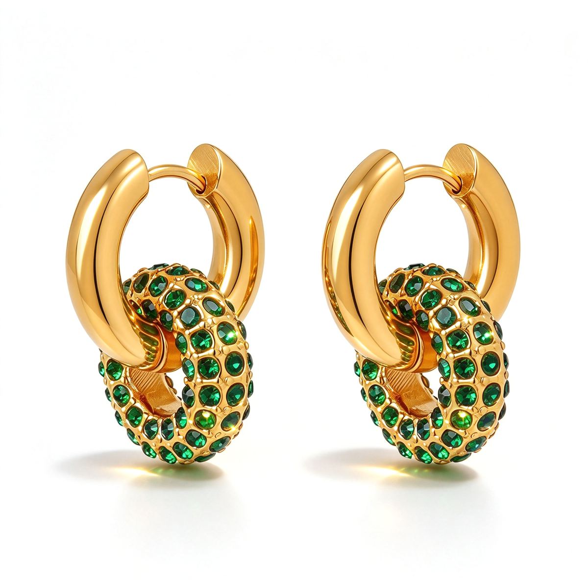 Gold-tone hoops with green circular accents shown from a three-quarter angle.