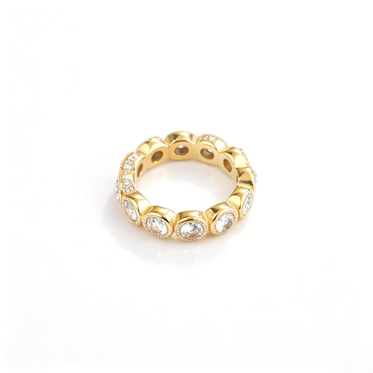 Round bezel band ring shown from an angled front view with repeating circular settings