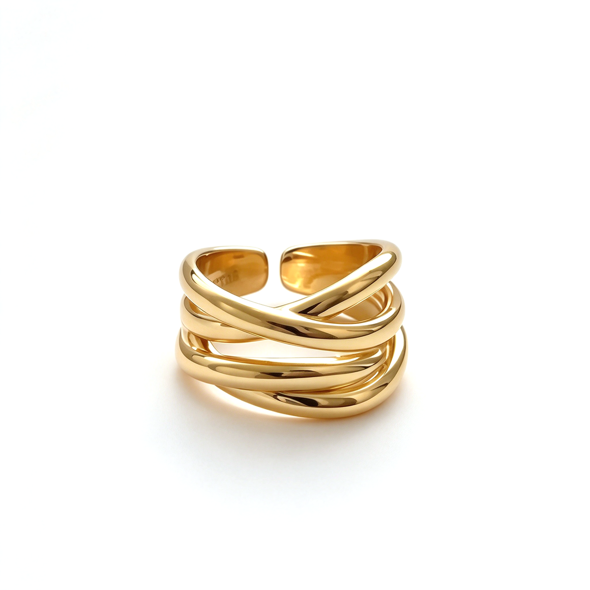 Gold-tone and silver-tone sculptural crossover rings shown side by side on a white background