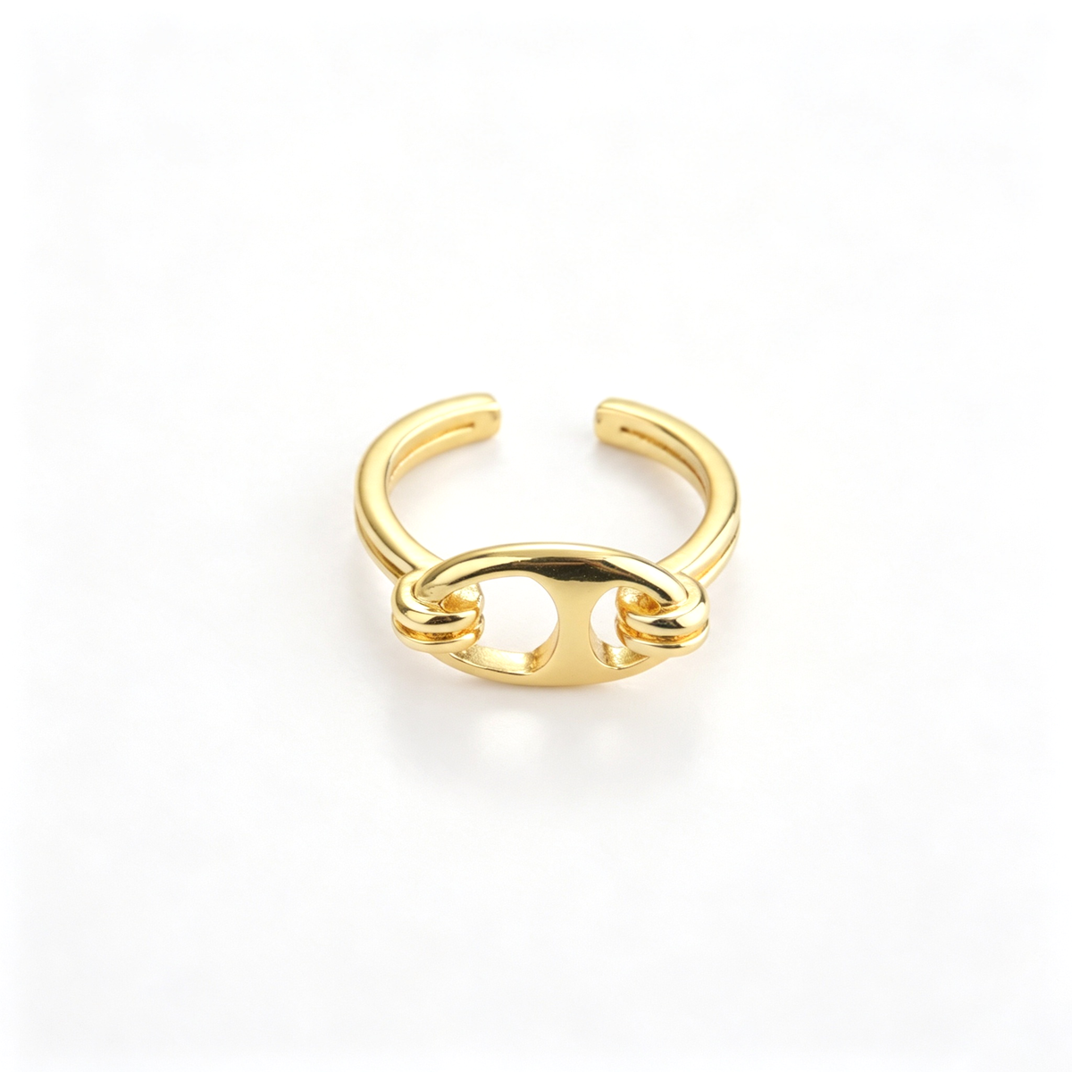 Sculptural cuff bracelet with rounded bar detail in a front view