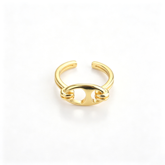 Sculptural cuff bracelet with rounded bar detail in a front view