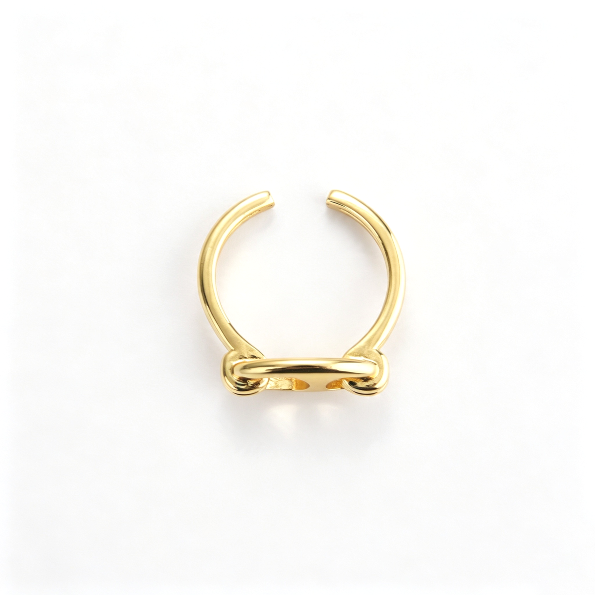 Sculptural cuff bracelet shown from an angled view with its open band