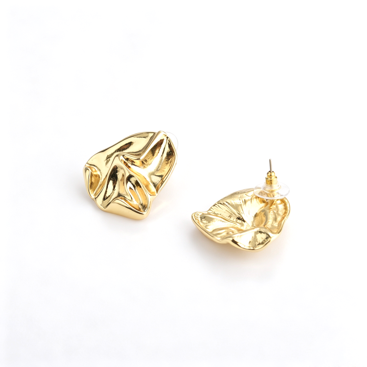 Back and side view showing steel post pins and disk backings of sculptural stud earrings