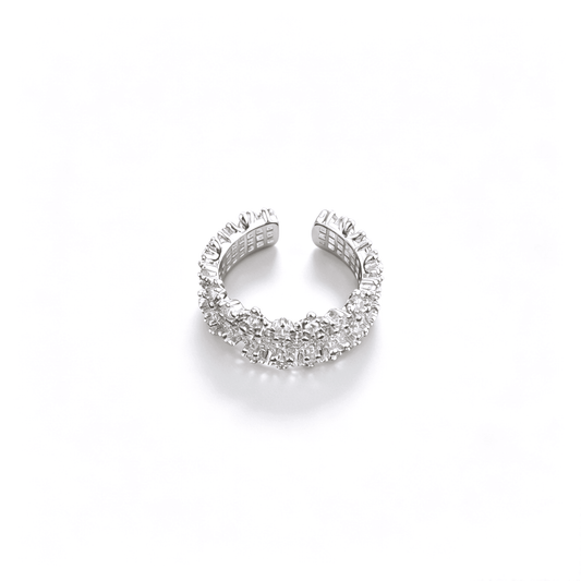 Front centered view of the silver-plated open band ring showcasing its dense multi-layer micro-pavé cubic zirconia stones and scalloped starburst edges.
