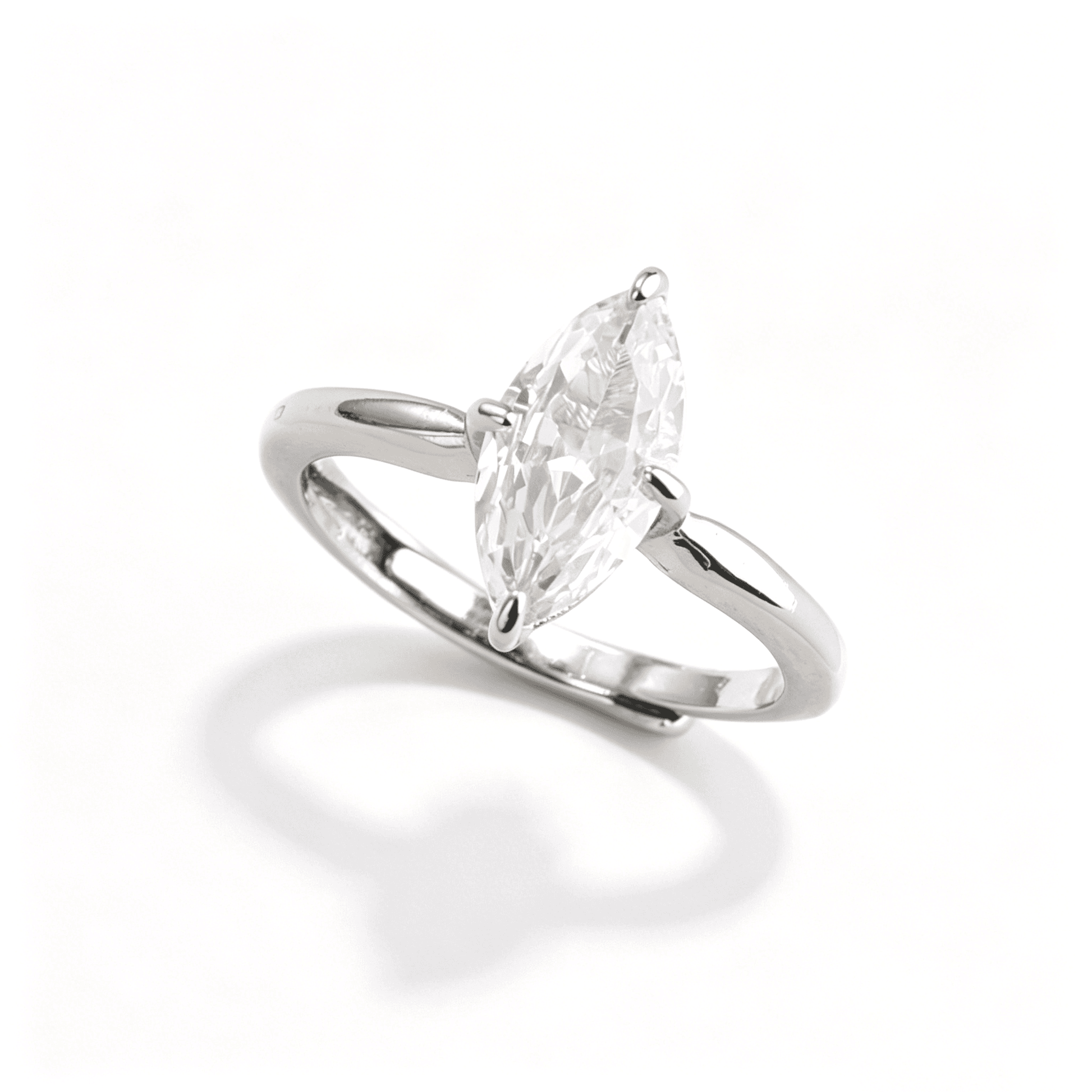 Angled shot of a stackable ring set highlighting the brilliance and clarity of the marquise cut zirconia stone.