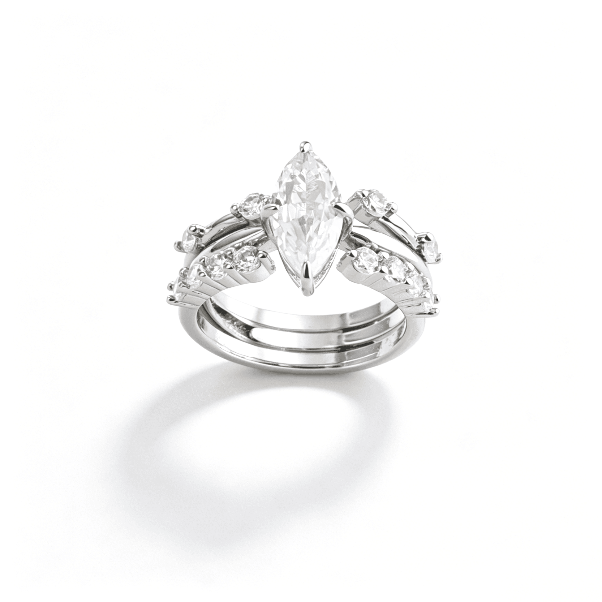 A 3-piece stackable ring set featuring a central marquise cut zirconia and two shimmering pavé accent bands.