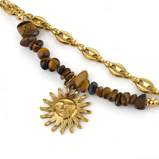Close-up of a 22mm sun flower pendant on a tarnish-free gold stainless steel jewelry chain.