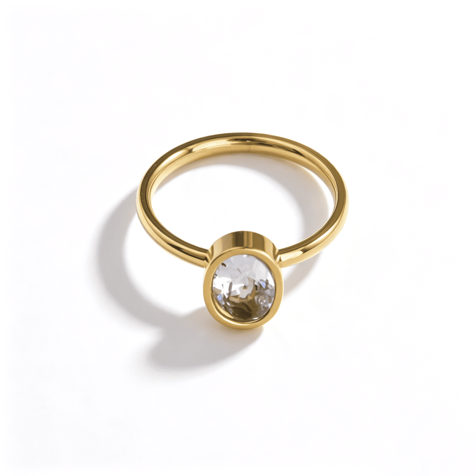 A tarnish-free stainless steel promise ring for her, showcasing an elegant oval cut center stone.
