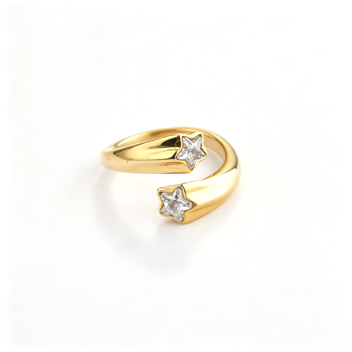 Open cuff ring shown from a front view, highlighting the curved band and twin star details