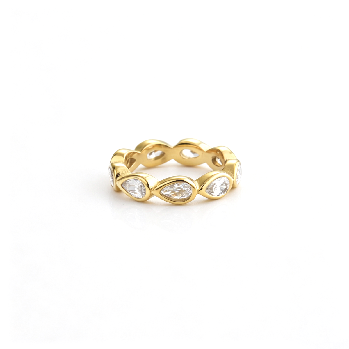 Band ring viewed from above, highlighting the continuous pattern of teardrop-shaped accents