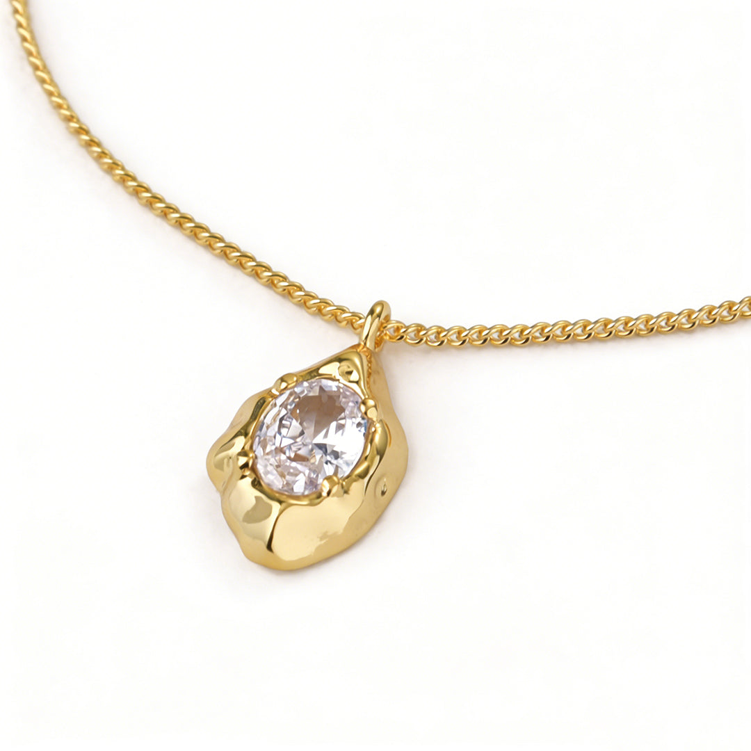 High-shine teardrop gold necklace with a micro-pave cubic zirconia halo for maximum sparkle.