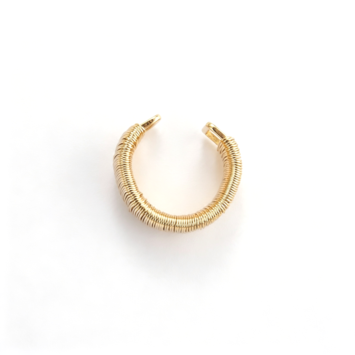 Ribbed cuff bracelet shown in a frontal view with its wide band and open cuff structure