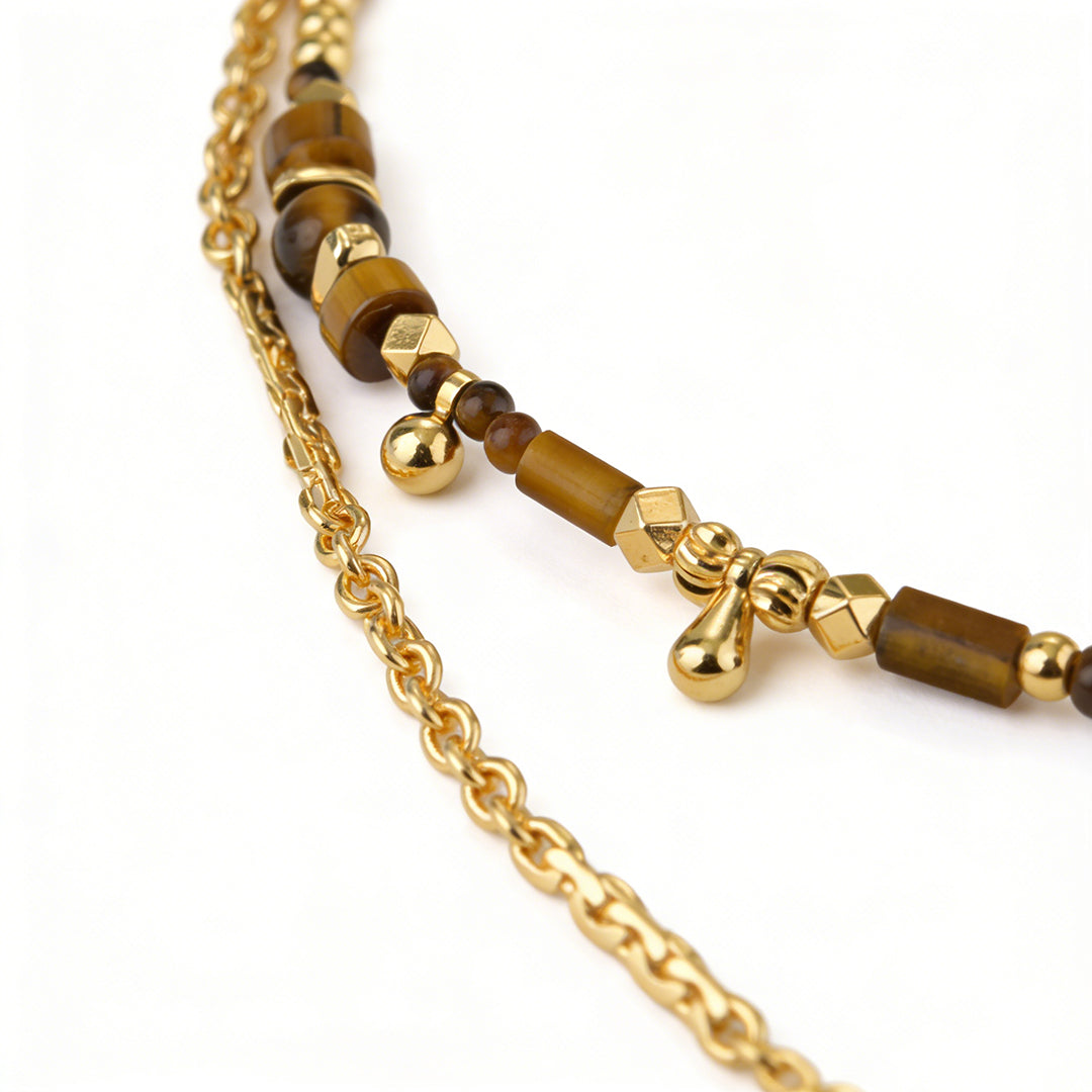 Tiger eye pendant necklace styled as a 38cm choker, perfect for jewelry layering.