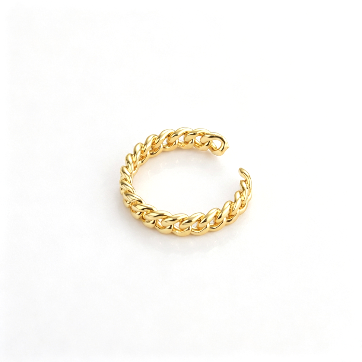Open cuff bracelet shown from above, highlighting the braided chain pattern