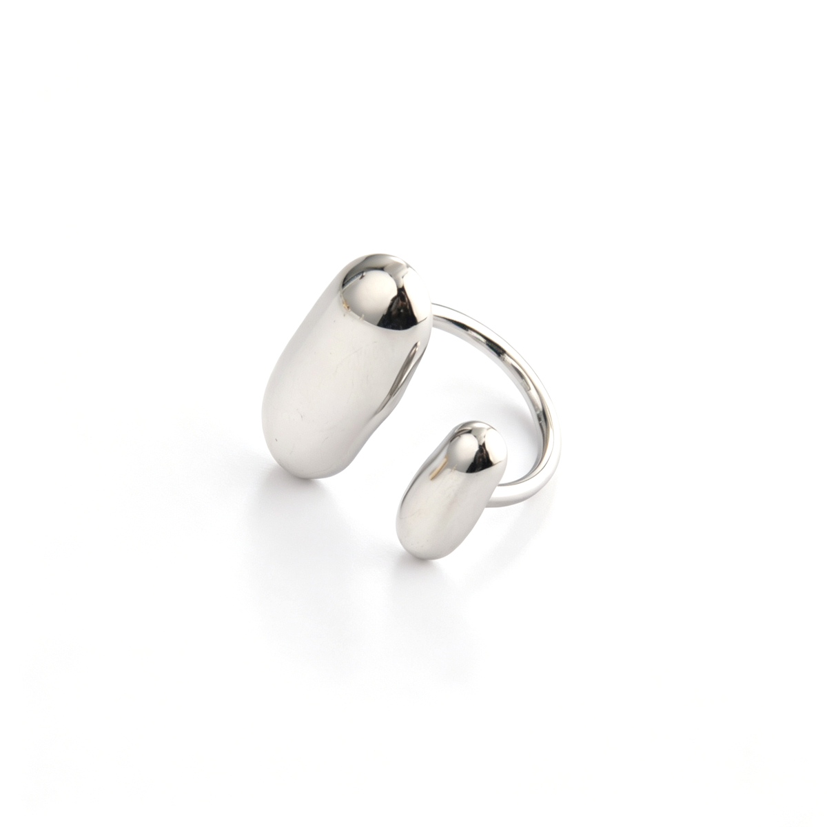 Two-tone open ring displayed with gold and silver rounded end details