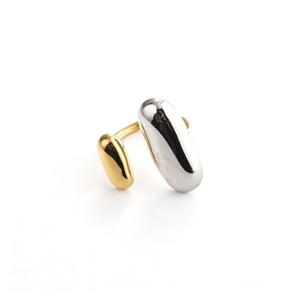 Sculptural cuff ring shown from the front with its asymmetrical rounded ends