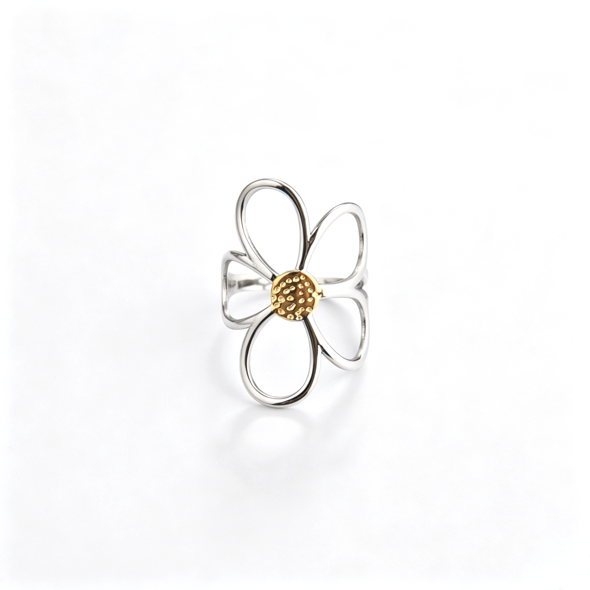 Front perspective displaying the openwork daisy petals and gold electroplated textured center.