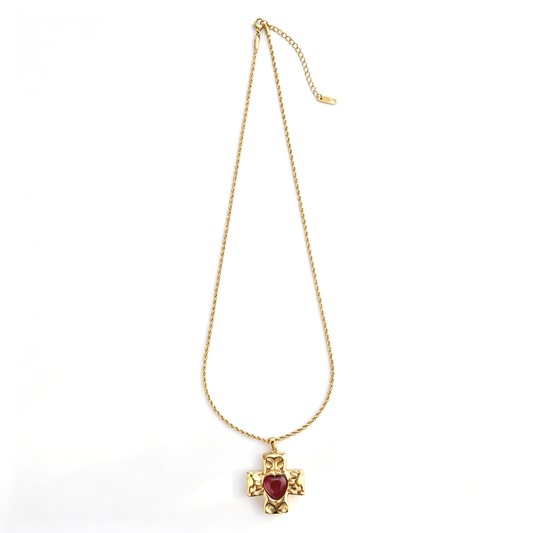 Full layout shot of the 18k gold-plated stainless steel red heart cross pendant on a rope chain.