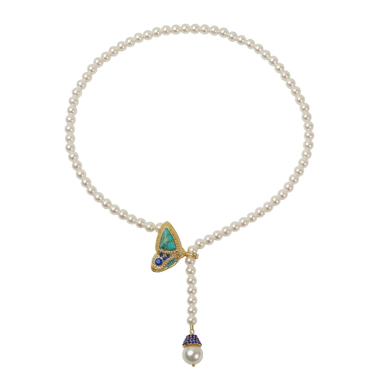 Studio shot of the 40cm vintage forest-style butterfly pearl Y-necklace, showcasing the turquoise wing clasp and dropping pearl end isolated on white background.