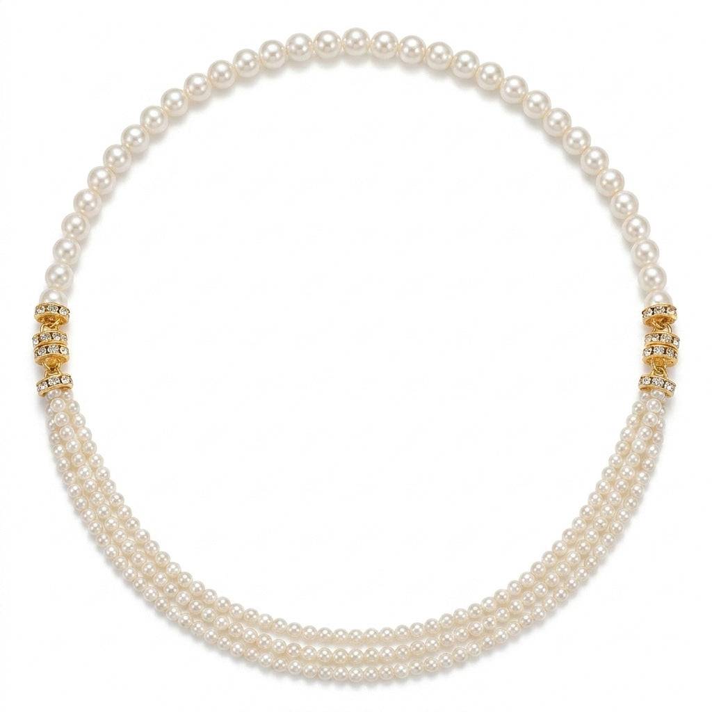 Symmetrical white multi-strand faux pearl necklace isolated on a white background, featuring a single large strand merging into a three-strand layer via gold-plated crystal connectors.