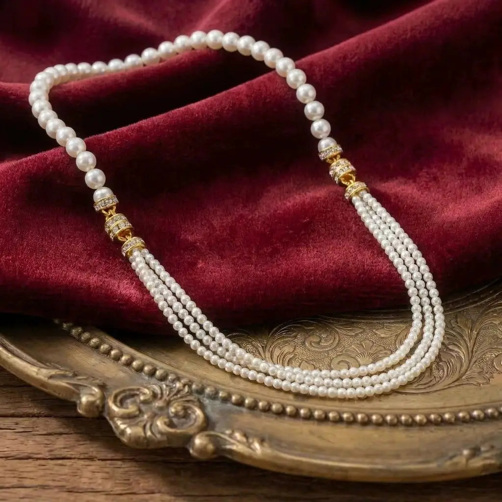 Full view of the 91cm white vintage inspired pearl layering necklace accented with 18k gold plated rhinestone crystal barrels.