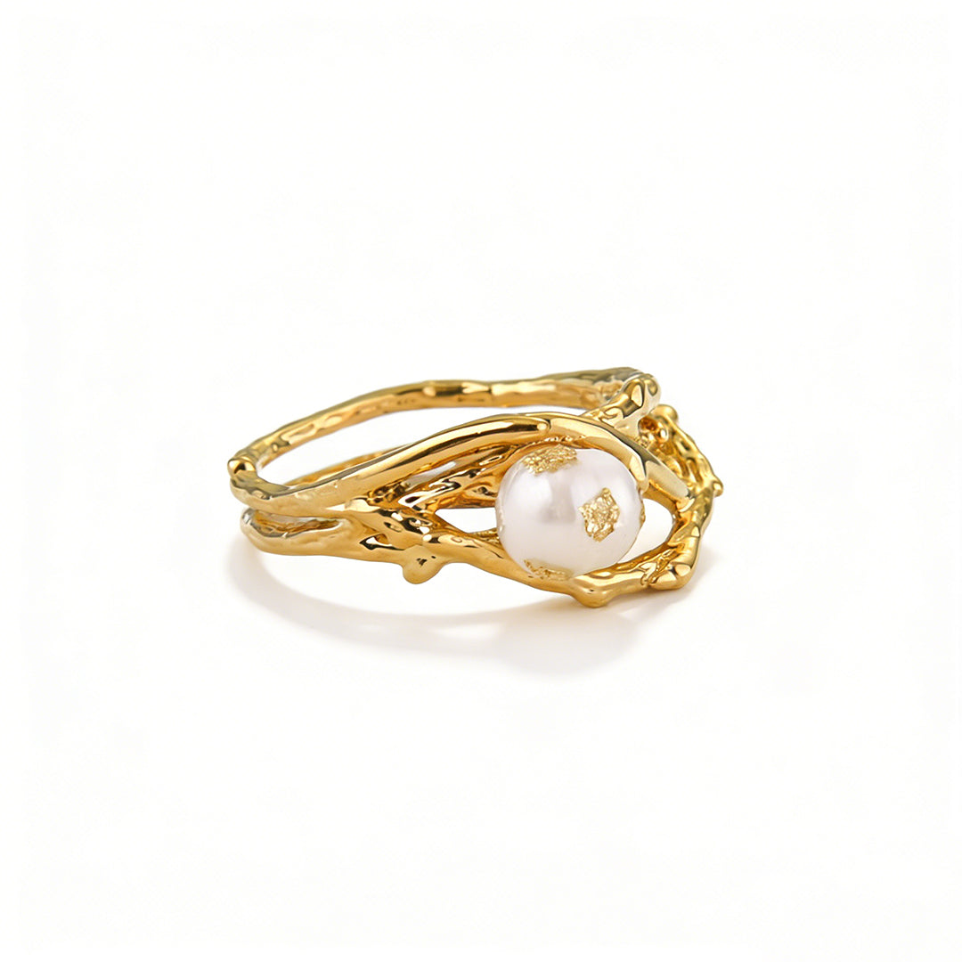 Modern vintage gold rings for women with an organic bird nest wire wrap and genuine pearl accent.