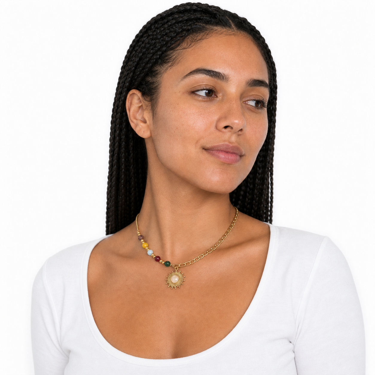 Three-quarter view of a young woman wearing the asymmetrical beaded sun necklace.