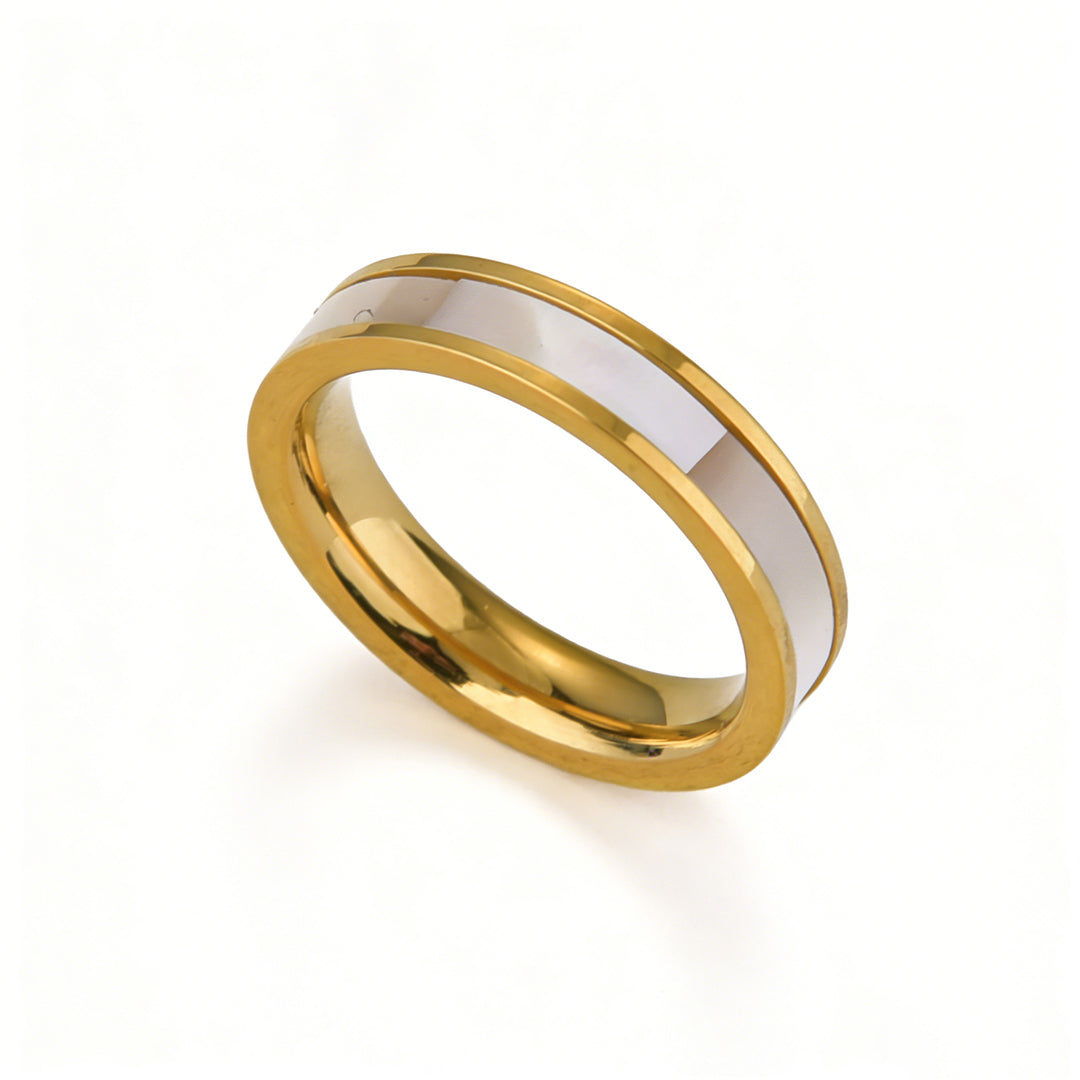 Close-up of a waterproof gold shell ring made of tarnish-free stainless steel jewelry for everyday wear.