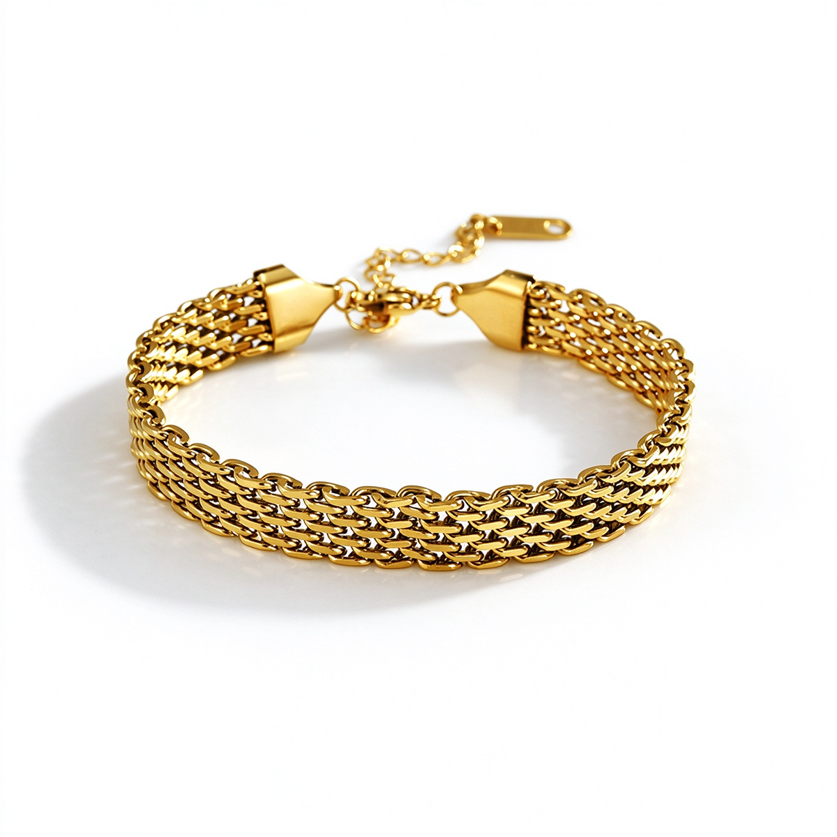 Gold-tone woven chain bracelet arranged in a circle, showing its layered links and clasp