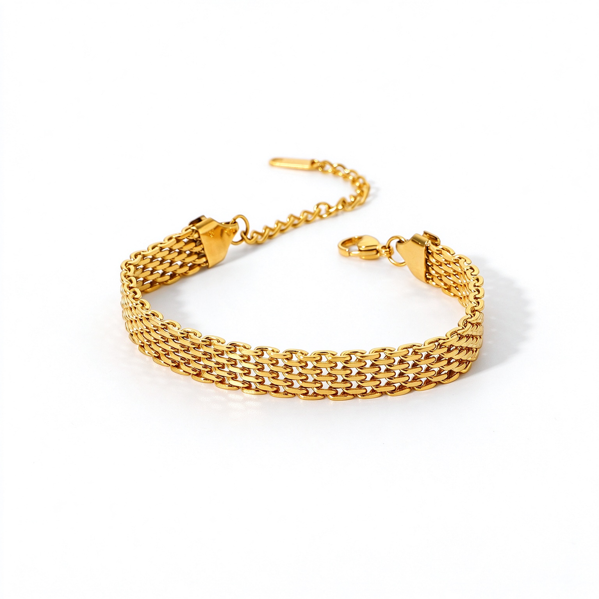 Angled view of a gold-tone bracelet highlighting its dense woven chain pattern
