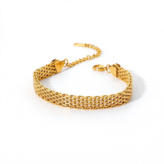 Angled view of a gold-tone bracelet highlighting its dense woven chain pattern